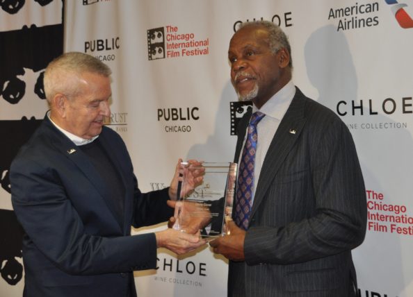 Danny Glover receiving the Visionary Award from Cinema Chicago founder and director Michael Kutza in Chicago on Thursday, October 20, 2016.