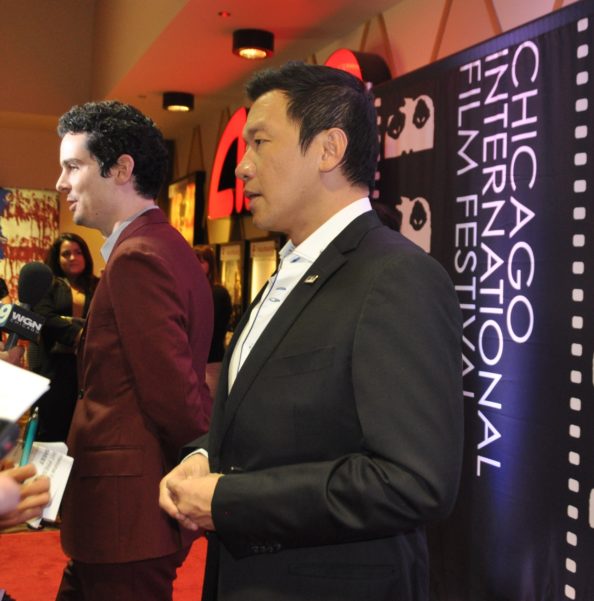 Chin Han (foreground), Damien Chazelle (background) on the Red Carpet at the 52nd Annual Chicago International Film Festival on October 13, 2016.