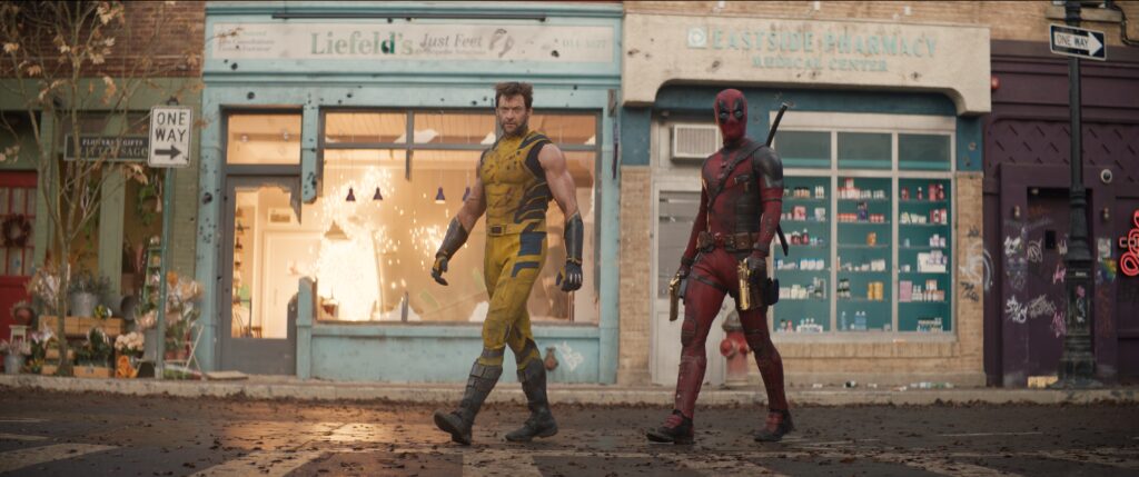 (L-R): Hugh Jackman as Wolverine/Logan and Ryan Reynolds as Deadpool/Wade Wilson in 20th Century Studios/Marvel Studios' DEADPOOL &amp; WOLVERINE. Photo courtesy of 20th Century Studios/Marvel Studios. © 2024 20th Century Studios / © and ™ 2024 MARVEL.