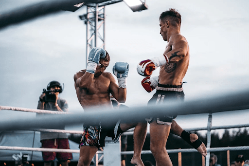 https://www.pexels.com/photo/two-men-doing-kickboxing-8991302/